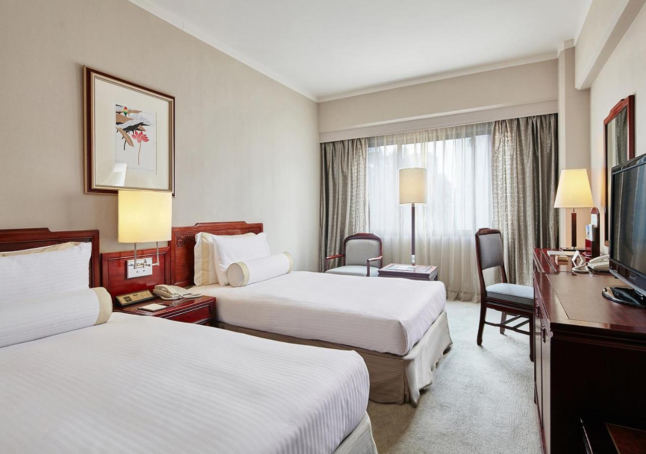 فندق ذا هوارد بلازا تايبي تايبيه الغرفة الصورة A room at the hotel